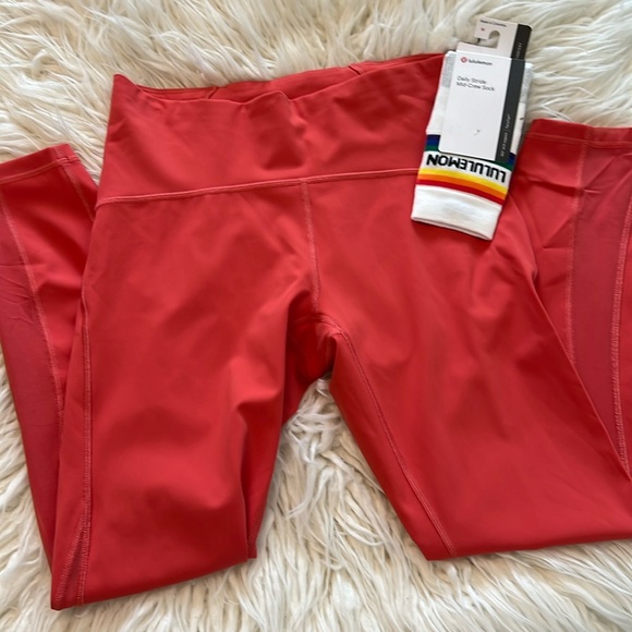 lululemon athletica Pants - Lululemon coral 🪸 legging w/ net detail on the legging and 🌈 socks. Sz 8 and M